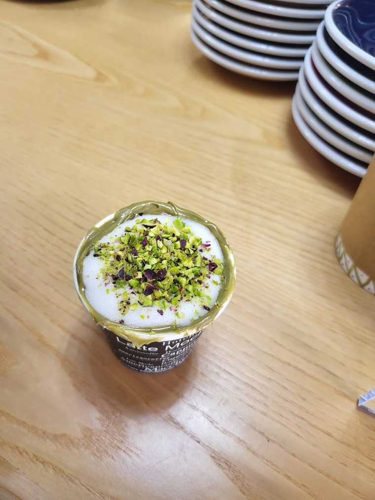 Yoghurt topped with crushed pistachio